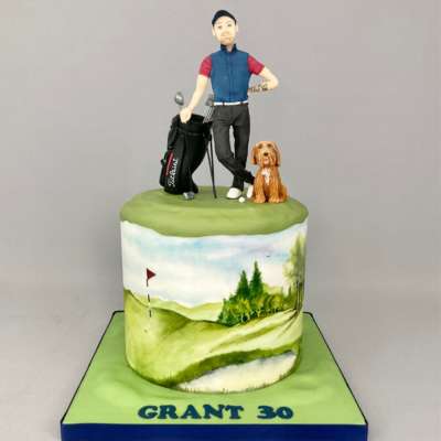 golfing birthday cake with figure model, model golf bag and model dog hand painted scene