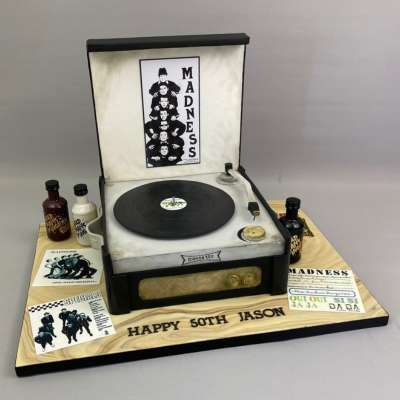 Record player illusion cake for a rum & ska loving man